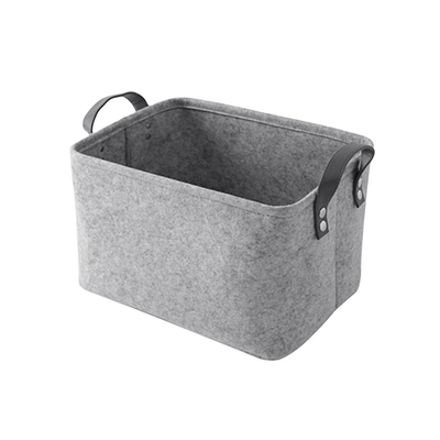 Contenedores de almacenamiento de fieltro rectangulares modernos en gris y negro organizados con estilo