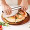 Tabla de cortar de la pizza de madera del acacia de la paleta de la pizza de la ronda del artículos de cocina