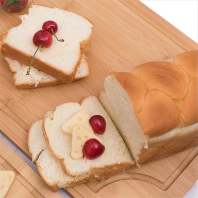 Tajadera de la tabla de cortar de bambú casera adaptable de la cocina con el fregadero